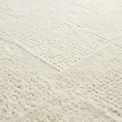 Macro close-up cream cotton bath mat diamond tufted texture