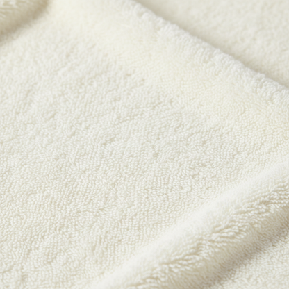 Close-up cream cotton terry loop texture macro detail