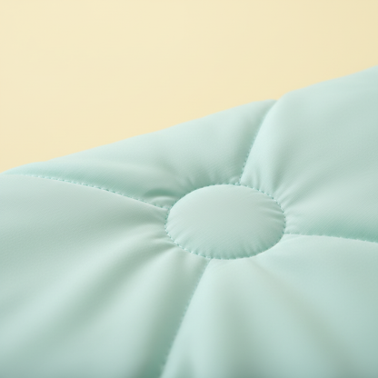 Close-up diamond quilt stitch pattern fabric texture yellow background