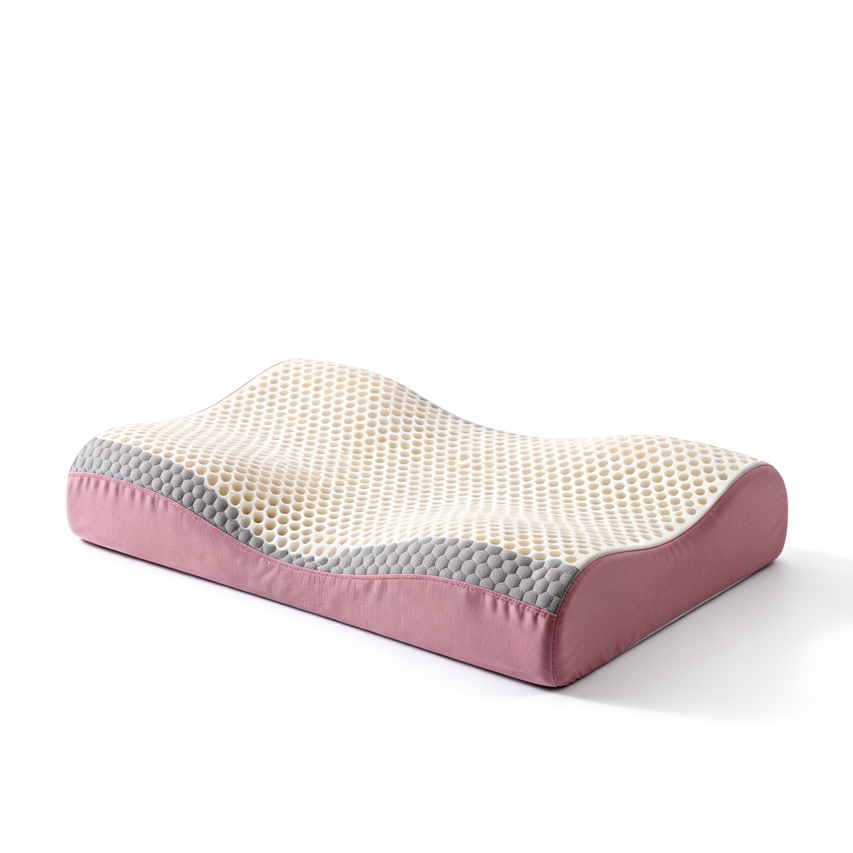 Pink ergonomic cervical memory foam pillow honeycomb mesh top white background