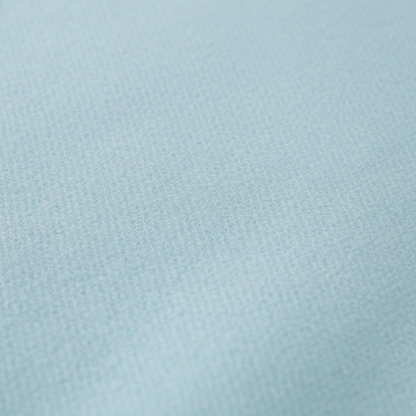 Close-up texture of soft blue fleece fabric