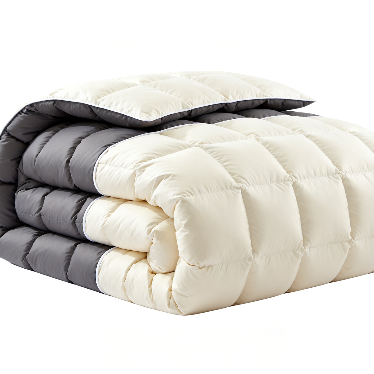 Reversible cream and charcoal comforter folded showing both sides