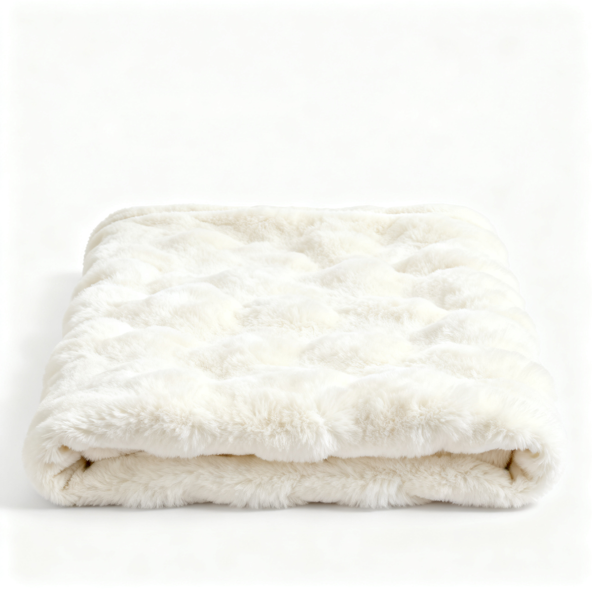 Cream ivory faux rabbit fur throw blanket folded white background