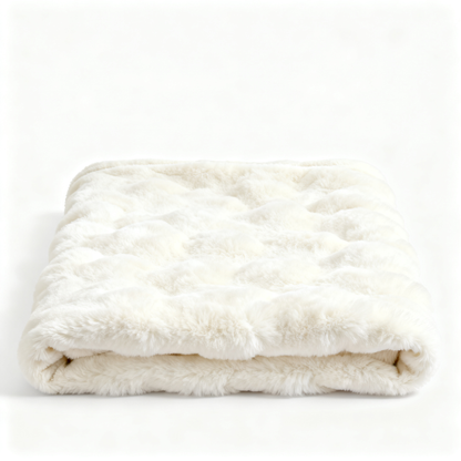 Cream ivory faux rabbit fur throw blanket folded white background
