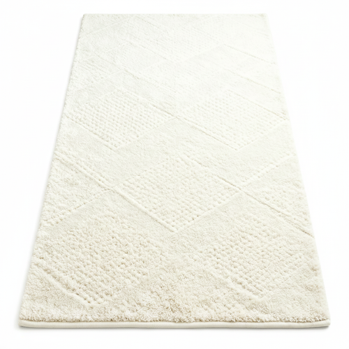 Cream geometric bath mat white background full product view